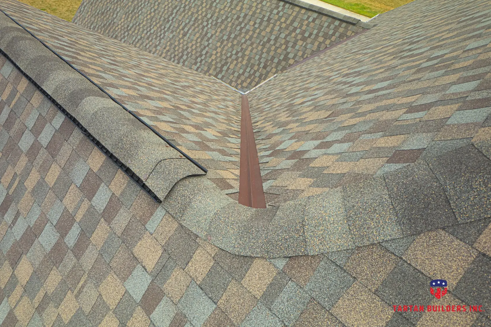 Roof valley metal flashing detail showing shingle installation overlap